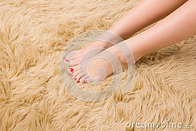 beautiful-female-feet-wool-carpet-12167668.jpg