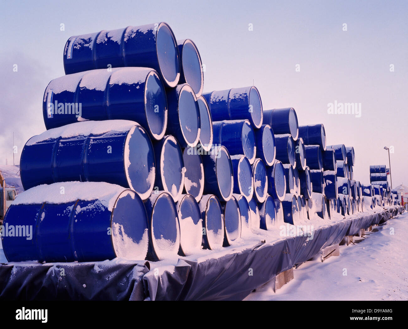 stack-of-55-gallon-fuel-drums-at-deadhorse-north-slope-of-alaska-D9YAMG.jpg