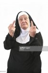 senior-nun-giving-two-middle-finger-gestures-isolated-on-white-picture-id108129744.jpeg