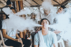 A group of boys making dragon smoke