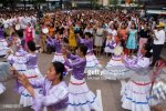 148921974-dancers-and-crowd-of-filipino-maids-gathered-gettyimages.jpg