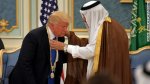 Trump bows to saudi..jpg