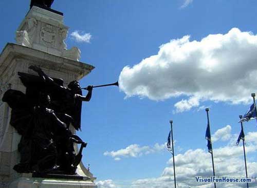 statue-blow-clouds-illusion.jpg