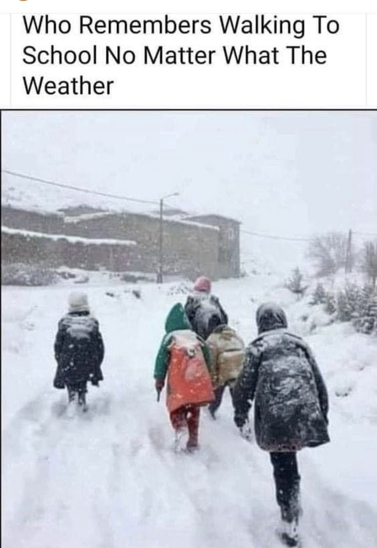 This may contain: people walking in the snow with backpacks on their back and one person wearing an orange jacket