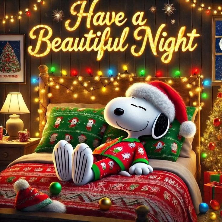 This may contain: a cartoon dog laying on top of a bed with christmas lights around him and the words have a beautiful night above it