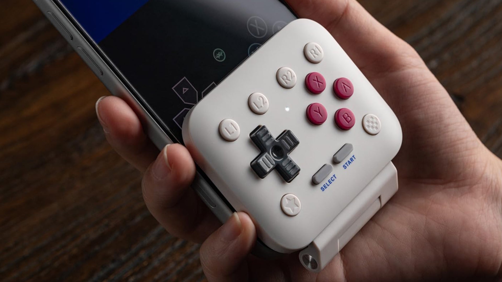8bitdo-flippad-on-phone-1784220106984.jpg