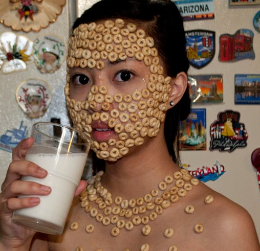 weird-girl-cheerios-stuck-face-13617274834.png