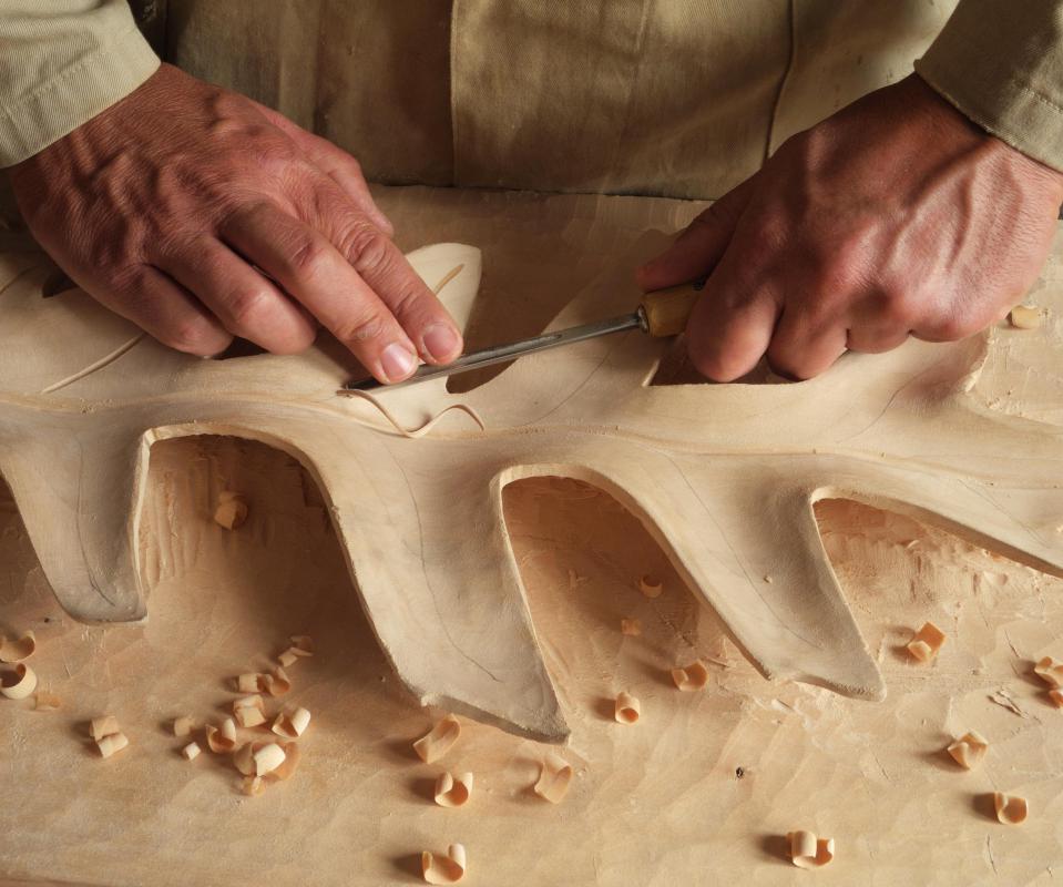 man-carving-a-leaf-bowl.jpg