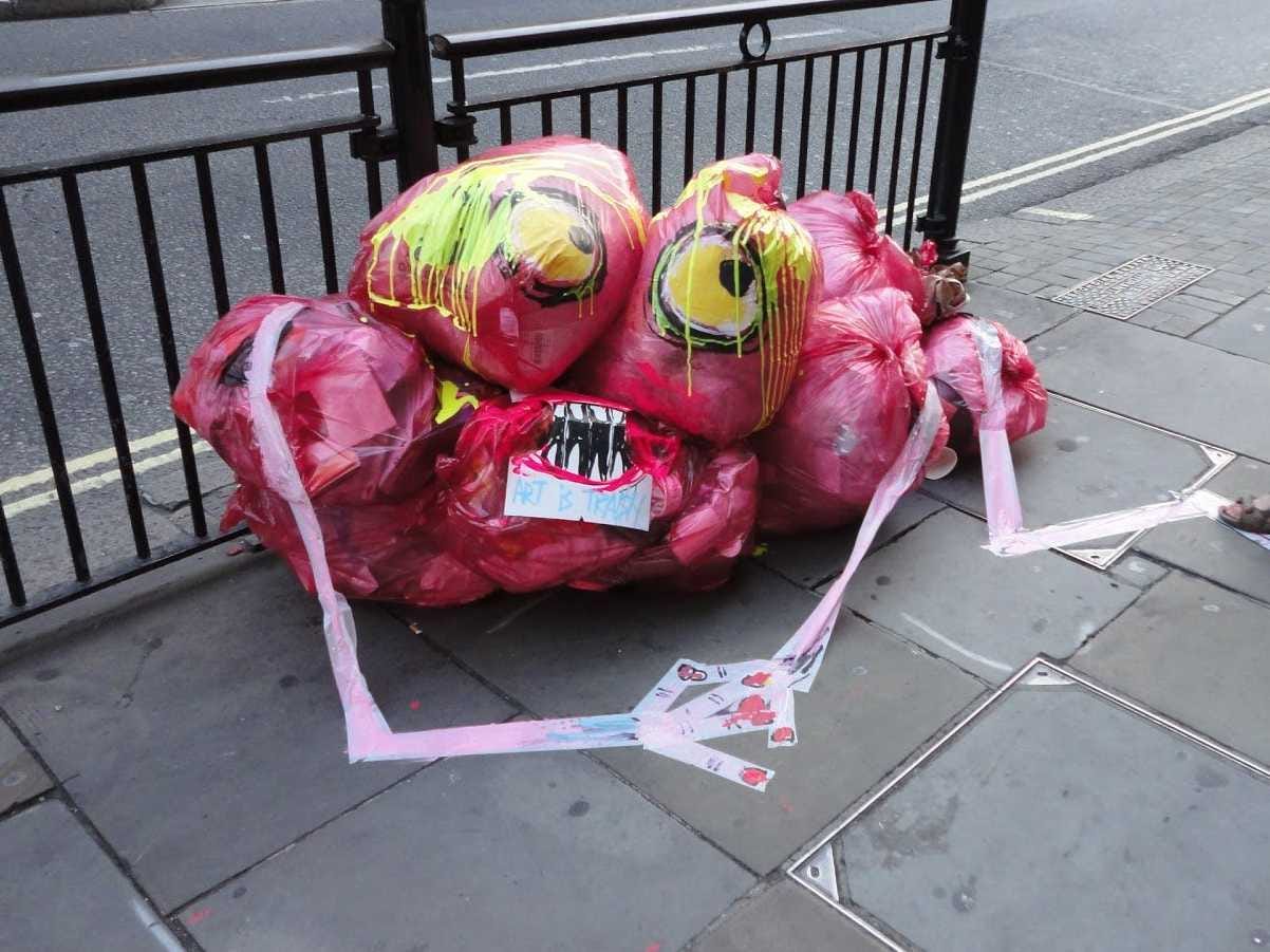 street-artist-makes-monsters-out-of-londons-garbage-photos.jpg