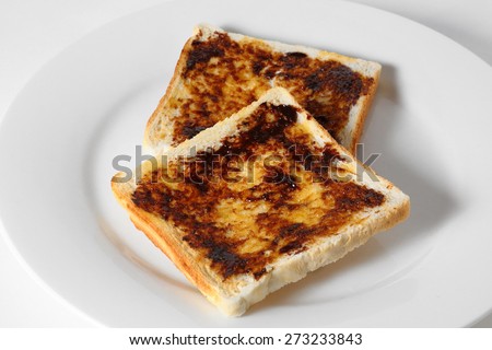 stock-photo-vegemite-or-marmite-on-toast-273233843.jpg